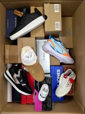 The photo shows a package with footwear in the category AS.