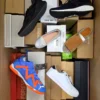 The photo shows a package with footwear in the category AS.