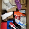 The photo shows a package with footwear in the category AS.