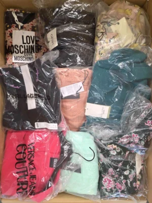 The photo shows a package with clothing in the category A.