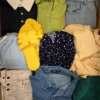 The photo shows a package with clothing in the category BSN.