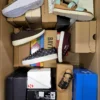 The photo shows a package with footwear in the category AS.