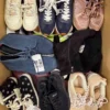 SH1223 1 The photo shows a package with footwear in the category SH.