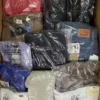 The photo shows a package with clothing in the category T.