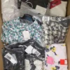 AD127 2 The photo shows a package with clothing in the category A.