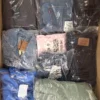 The photo shows a package with clothing in the category T.