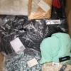 The photo shows a package with clothing in the category A.