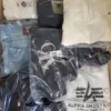 The photo shows a package with clothing in the category T.