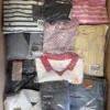 The photo shows a package with clothing in the category T.