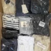 The photo shows a package with clothing in the category T.