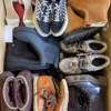 SH1446 1 The photo shows a package with footwear in the category SH.