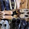 The photo shows a package with footwear in the category SH.