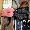 The photo shows a package with footwear in the category SH.
