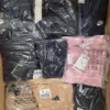 The photo shows a package with clothing in the category T.