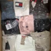 The photo shows a package with clothing in the category T.