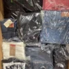 The photo shows a package with clothing in the category T.