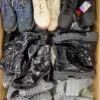 The photo shows a package with footwear in the category CSU.