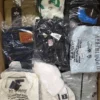 The photo shows a package with clothing in the category T.