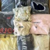 The photo shows a package with clothing in the category D.