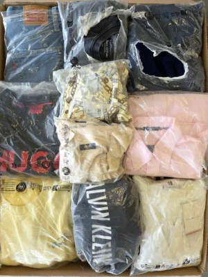 The photo shows a package with clothing in the category D.