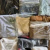 The photo shows a package with clothing in the category D.