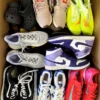 The photo shows a package with footwear in the category SH.