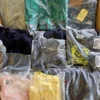 The photo shows a package with clothing in the category D.
