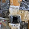 The photo shows a package with clothing in the category D.