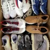The photo shows a package with footwear in the category SH.