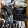 The photo shows a package with footwear in the category CSU.