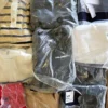 The photo shows a package with clothing in the category D.