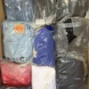 The photo shows a package with clothing in the category D.