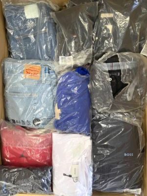 The photo shows a package with clothing in the category D.