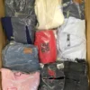 The photo shows a package with clothing in the category D.