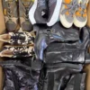 The photo shows a package with footwear in the category CSU.