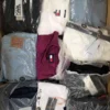 The photo shows a package with clothing in the category D.