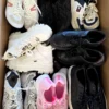 The photo shows a package with footwear in the category SH.
