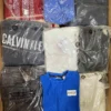 The photo shows a package with clothing in the category D.