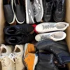 The photo shows a package with footwear in the category SH.