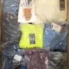 The photo shows a package with clothing in the category D.