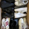 The photo shows a package with footwear in the category CSU.