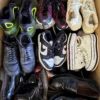 The photo shows a package with footwear in the category SH.