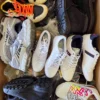 The photo shows a package with footwear in the category CSU.