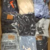 The photo shows a package with clothing in the category T.