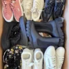 The photo shows a package with footwear in the category CSU.