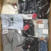 The photo shows a package with clothing in the category T.