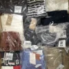The photo shows a package with clothing in the category T.