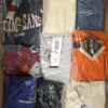 The photo shows a package with clothing in the category B.