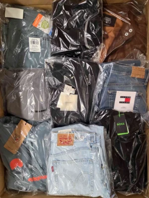 The photo shows a package with clothing in the category B.