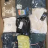 The photo shows a package with clothing in the category B.